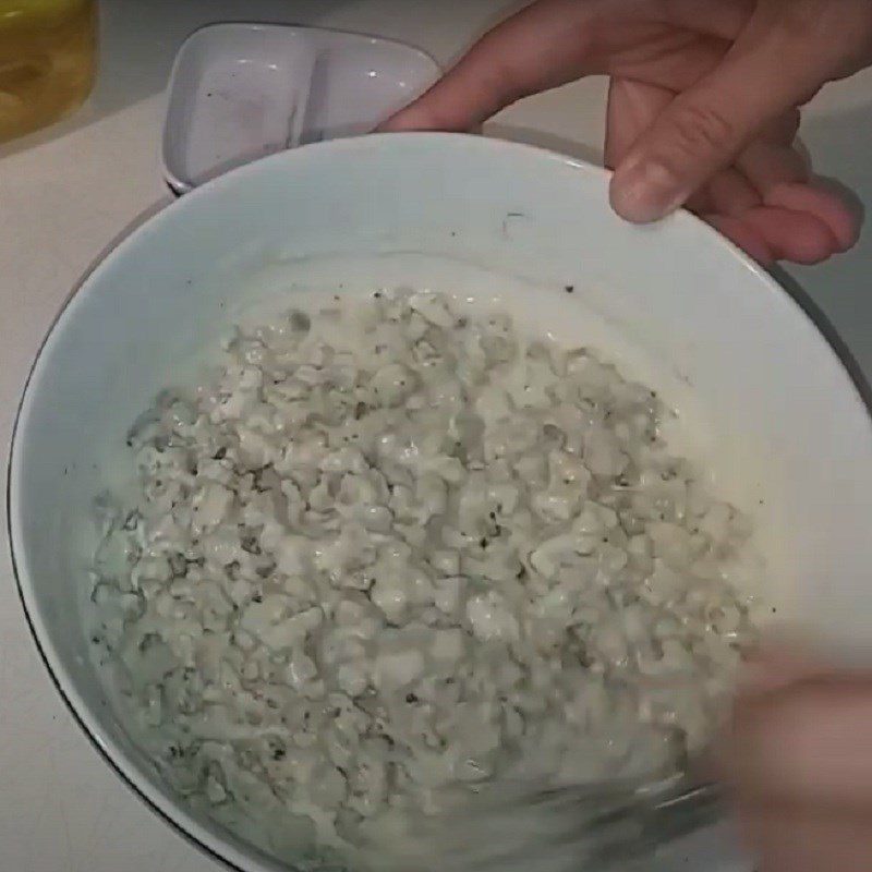 Step 2 Mix clams into the batter for Fried Clam Cake