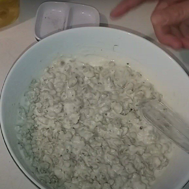 Step 2 Mix clams into the batter for Fried Clam Cake