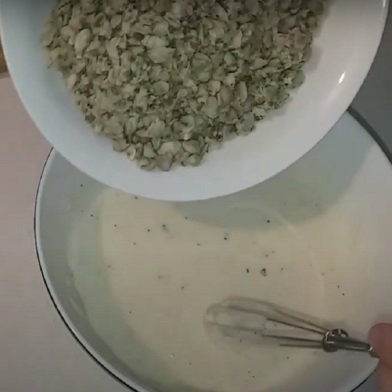 Step 2 Mix clams into the batter for Fried Clam Cake
