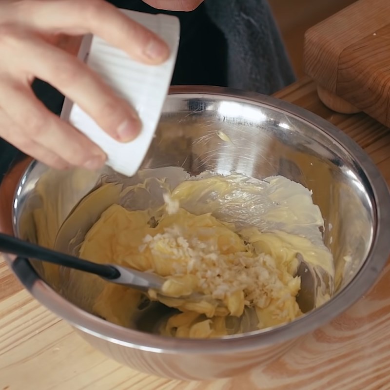 Step 3 Mixing the garlic butter mixture Caesar salad garlic bread