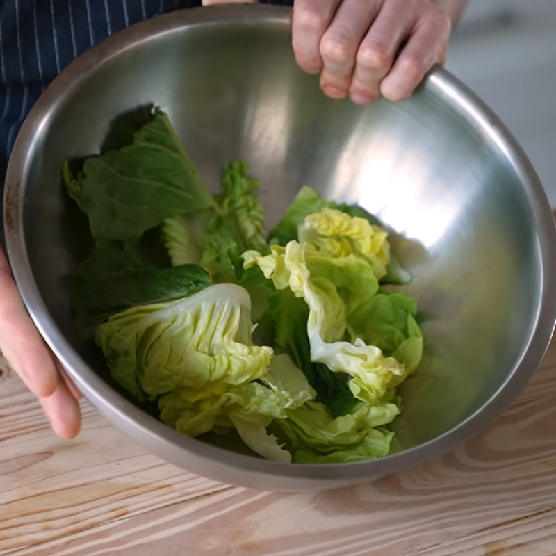 Step 5 Mixing salad Caesar salad garlic bread