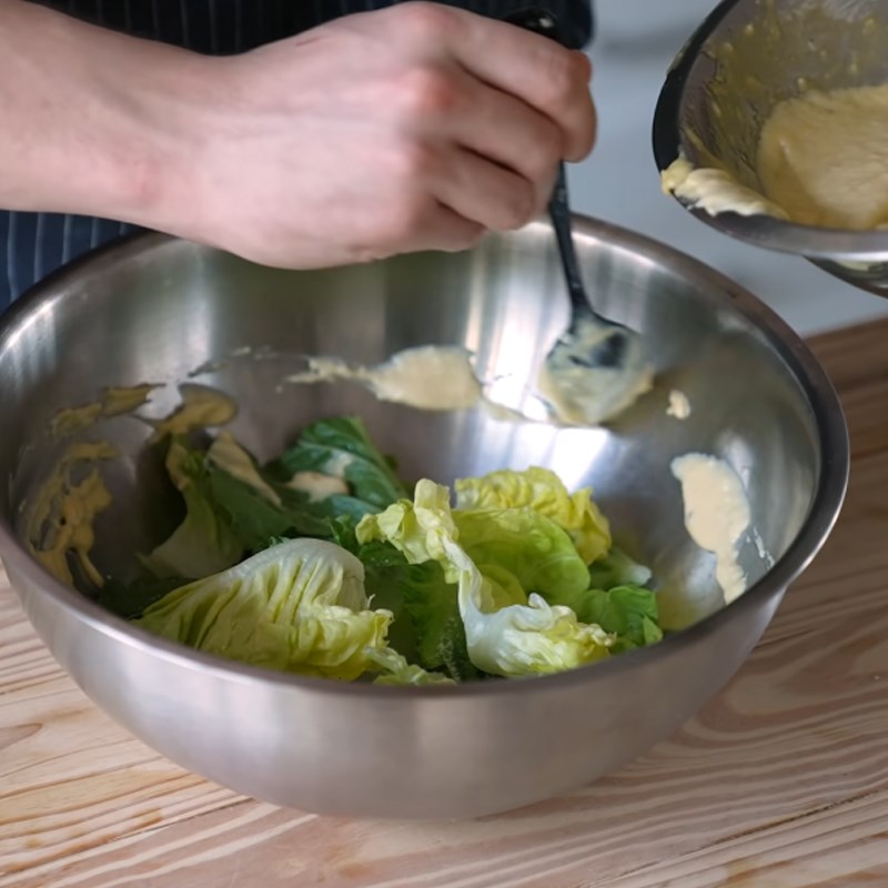 Step 5 Mixing salad Caesar salad garlic bread