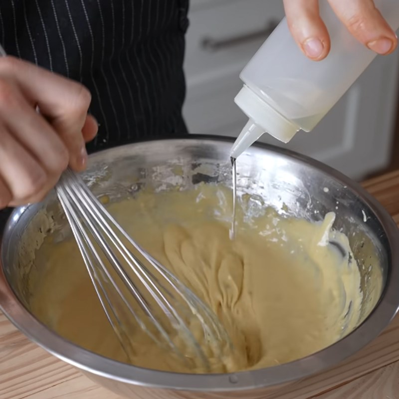 Step 2 Mixing the salad dressing Caesar salad garlic bread