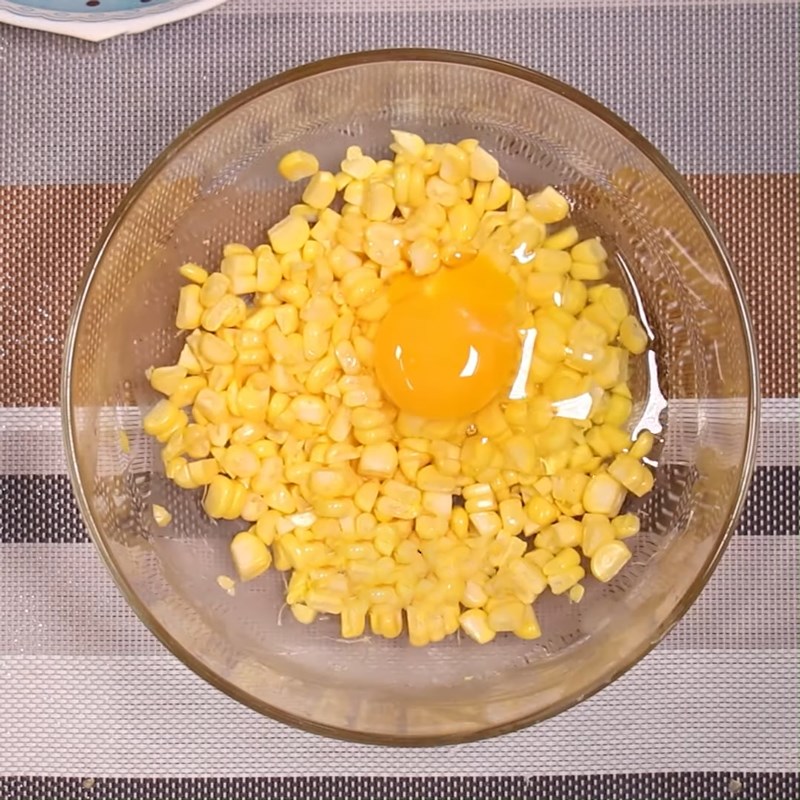 Step 2 Mix eggs with corn for Fried Corn (Maize) Eggs and Sausages