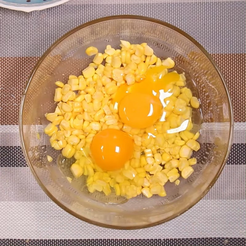 Step 2 Mix eggs with corn for Fried Corn (Maize) Eggs and Sausages