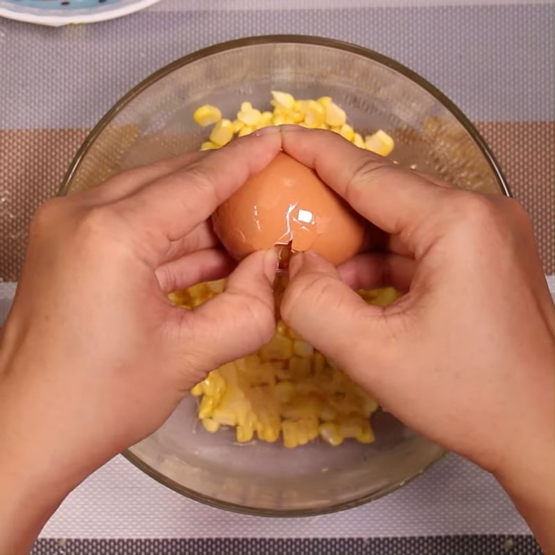 Step 2 Mix eggs with corn for Fried Corn (Maize) Eggs and Sausages