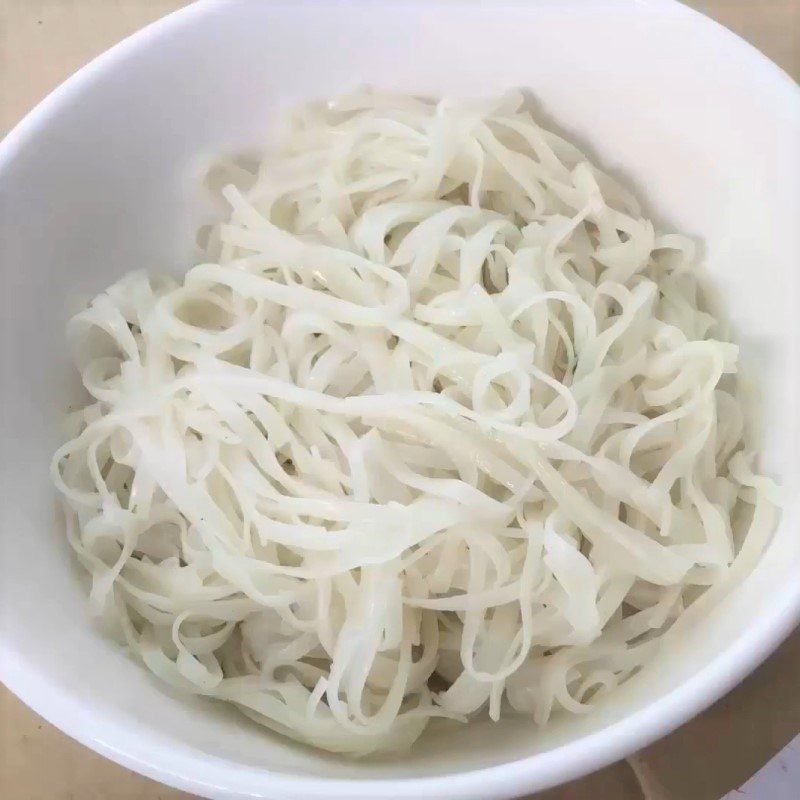 Step 6 Blanching noodles and finishing Fish noodle soup with mustard greens