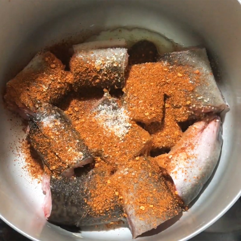 Step 2 Marinate the fish Eel cooked with turmeric