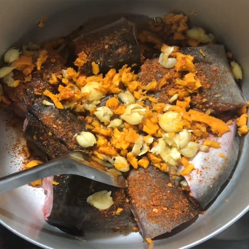 Step 2 Marinate the fish Eel cooked with turmeric