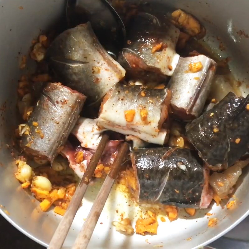 Step 2 Marinate the fish Eel cooked with turmeric