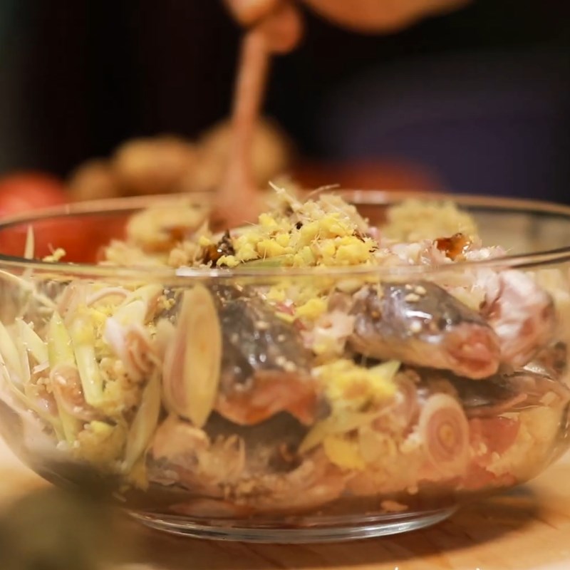 Step 2 Marinating fish Snakehead fish with galangal