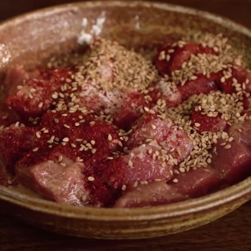 Step 2 Marinate the beef Beef fried with sesame