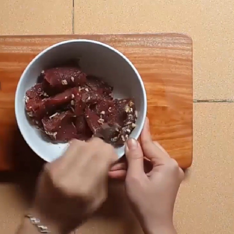 Step 2 Marinate the beef Crispy fried beef