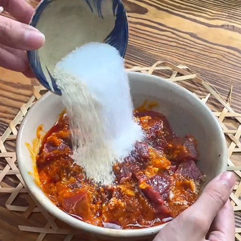 Step 1 Marinate the beef for Spicy Beef Hotpot (Recipe shared from TikTok Cooking with TasteVN)