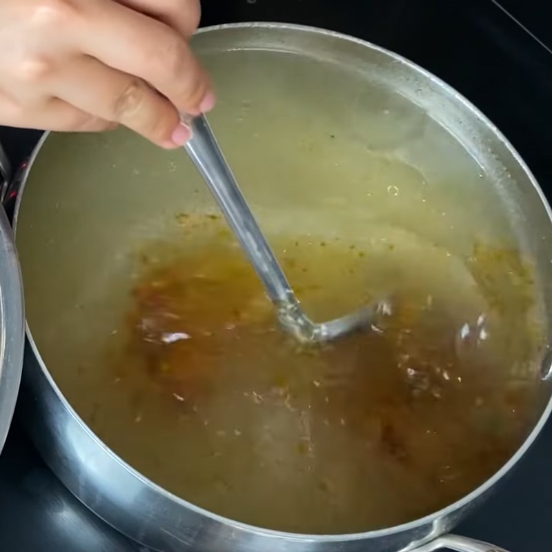 Step 4 Remove the meat and add the satay Pork intestine noodle