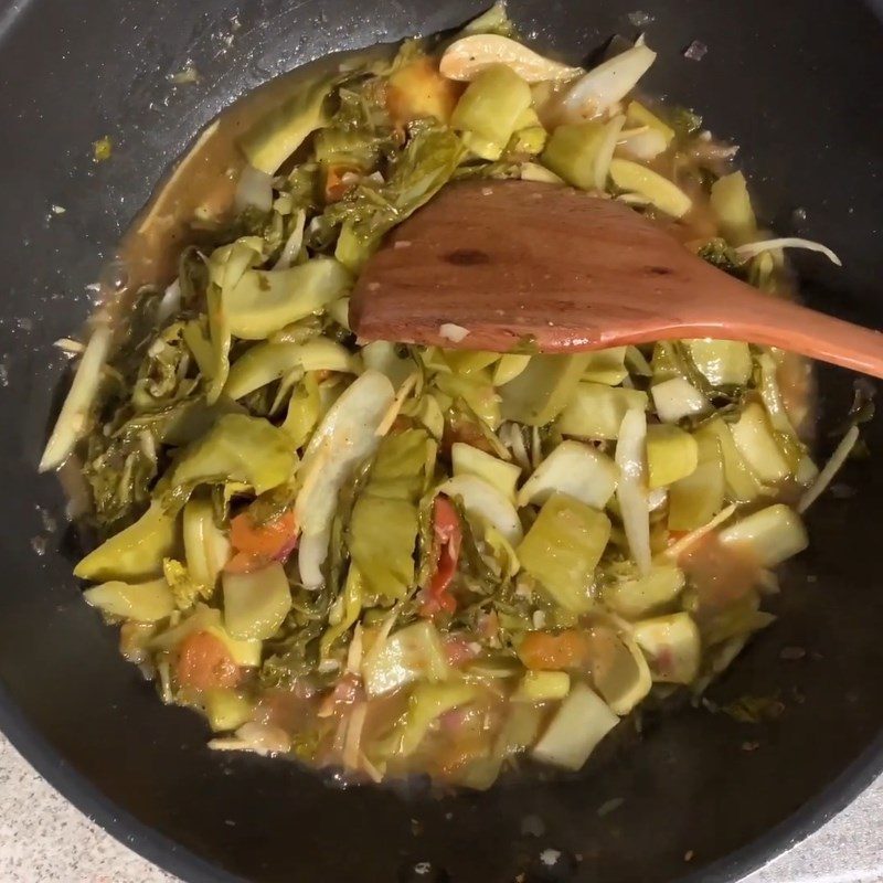 Step 4 Stir-fry tomatoes with pickled vegetables Barramundi (striped bass) braised with pickled vegetables