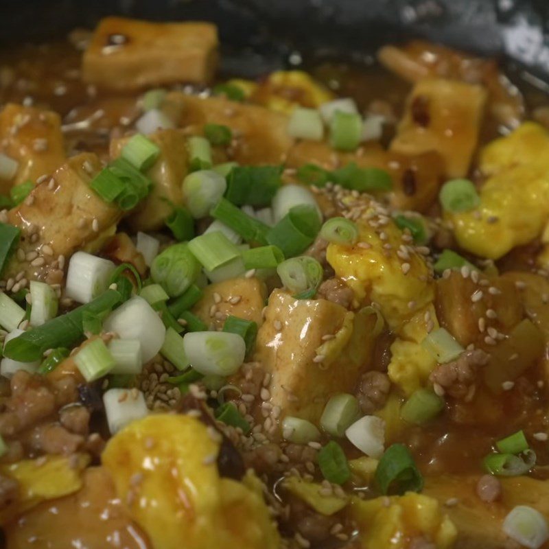 Step 5 Stir-fry tofu with eggs