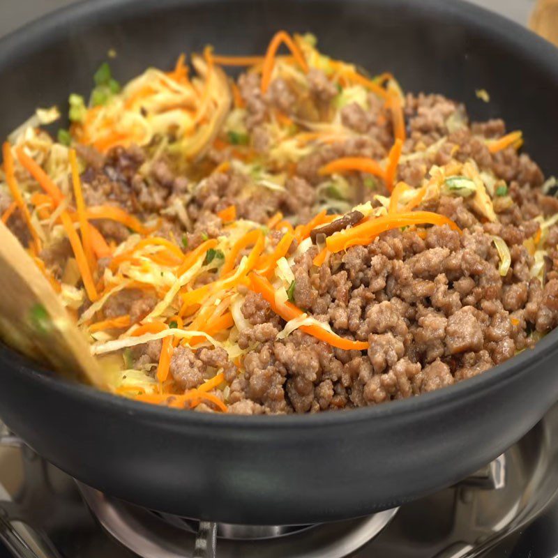Step 6 Stir-fry mushrooms and vegetables for beef mushroom spring rolls