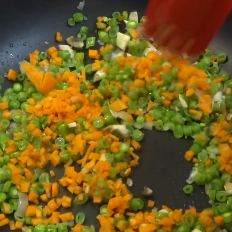 Step 2 Sauté ingredients for colorful fried egg rolls