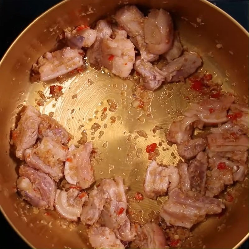 Step 3 Sauté the meat with basa fish for Mắm Ruốc Hotpot