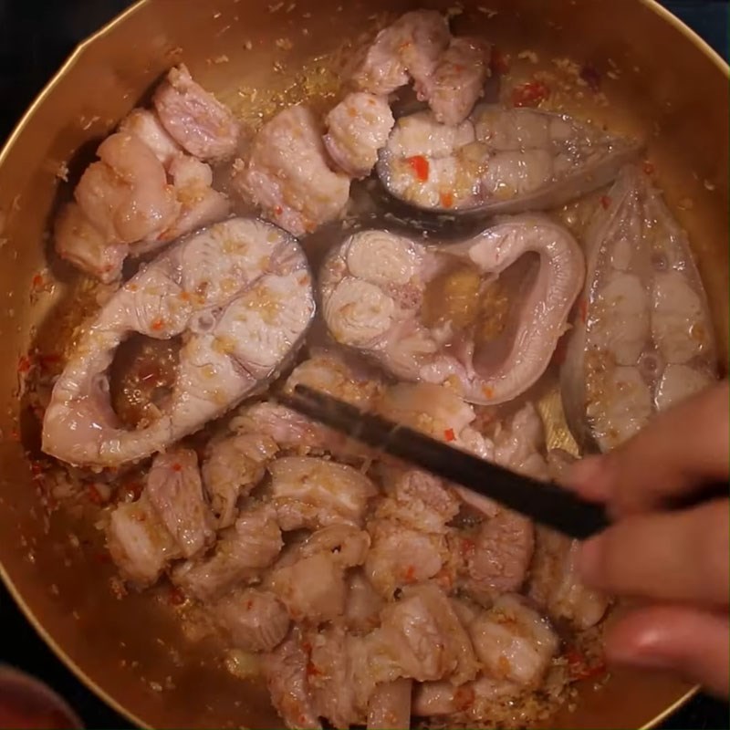 Step 3 Sauté the meat with basa fish for Mắm Ruốc Hotpot