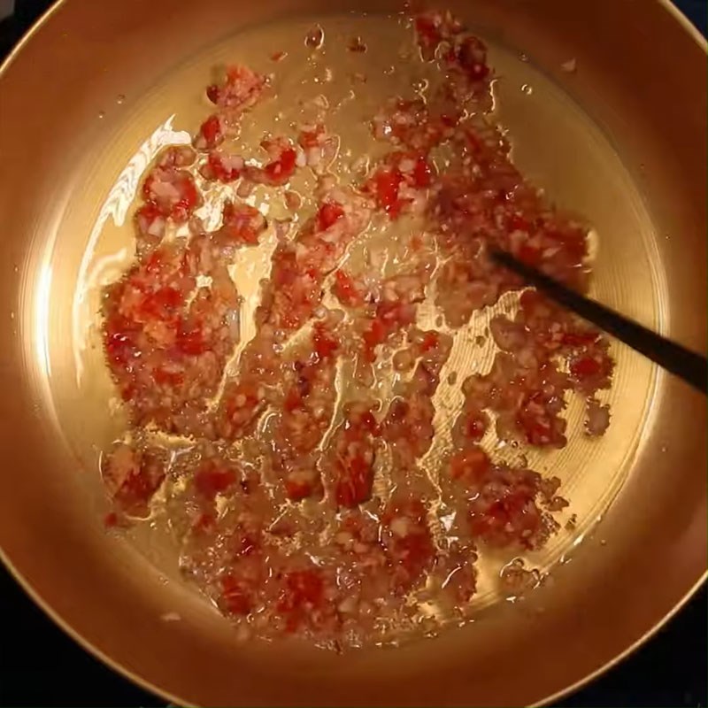 Step 3 Stir-fry meat with basa fish for Shrimp Paste Hotpot