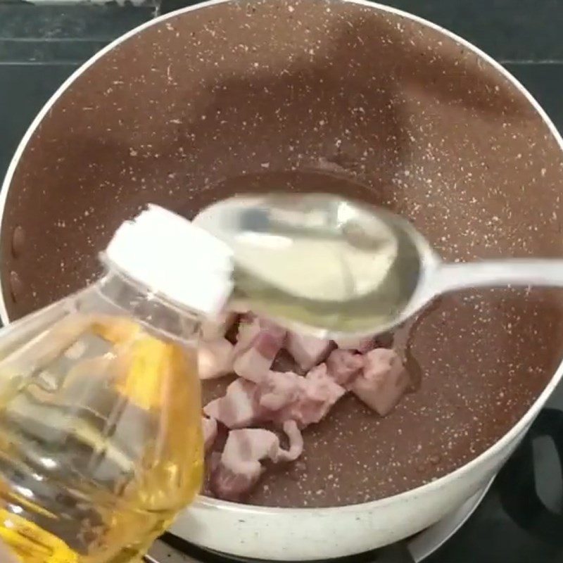 Step 3 Sauté the meat for Braised Mackerel