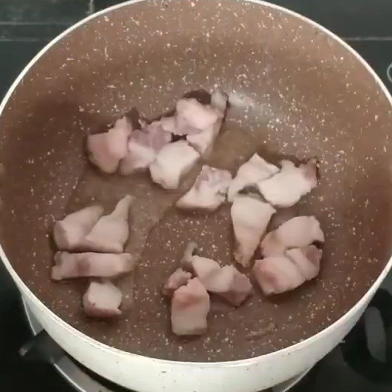 Step 3 Sauté the meat for Braised Mackerel