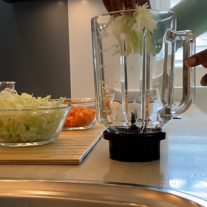 Step 2 Blend cabbage with carrot for Carrot Cabbage Juice