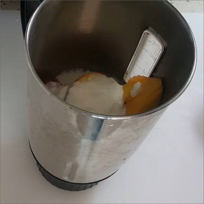 Step 2 Blend the ingredient mixture for Yogurt Peach Smoothie