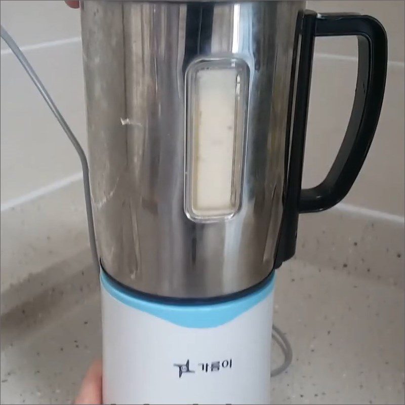 Step 2 Blend the ingredient mixture for Yogurt Peach Smoothie