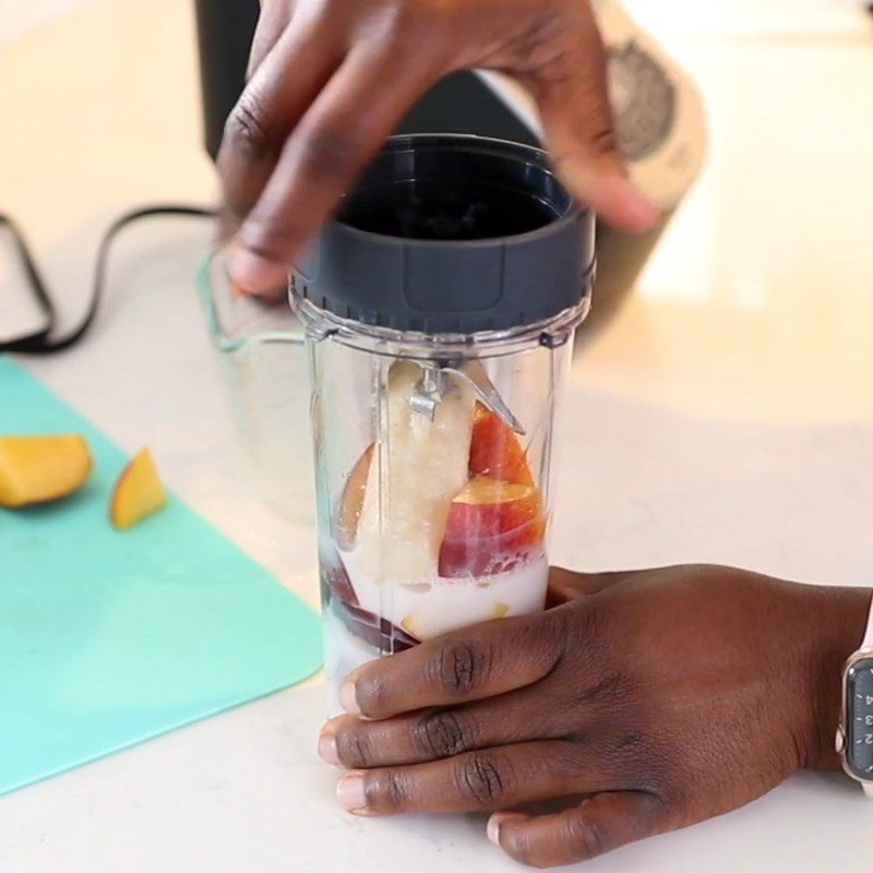 Step 2 Blend the ingredient mixture Peach Banana smoothie