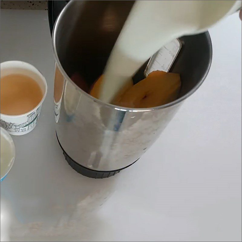 Step 2 Blend the ingredient mixture for Yogurt Peach Smoothie