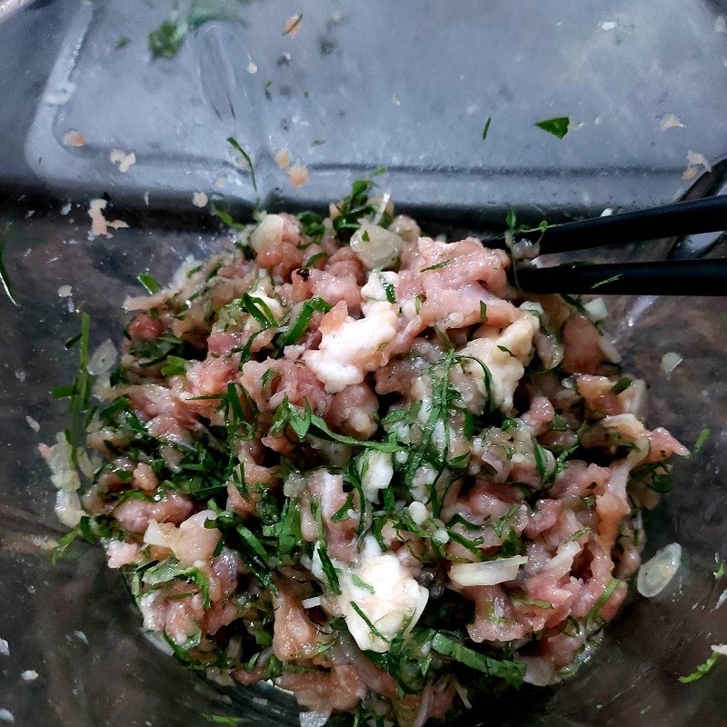 Step 2 Grinding and marinating meat for Pork Sausage Wrapped in Betel Leaves