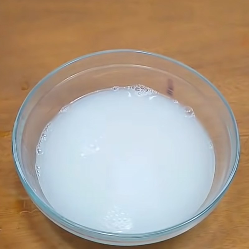 Step 1 Wash rice to get water for Western Pickled Melon