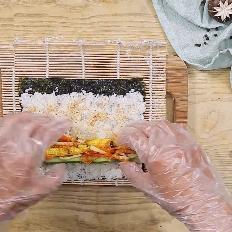 Step 4 Rolling sushi Vegetarian sushi with sautéed mushrooms and vegetables