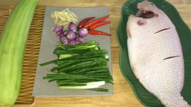 Ingredients for steamed red tilapia dish with gourd