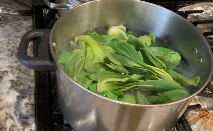 Step 2 Blanching noodles and vegetables Duck noodles with roasted duck