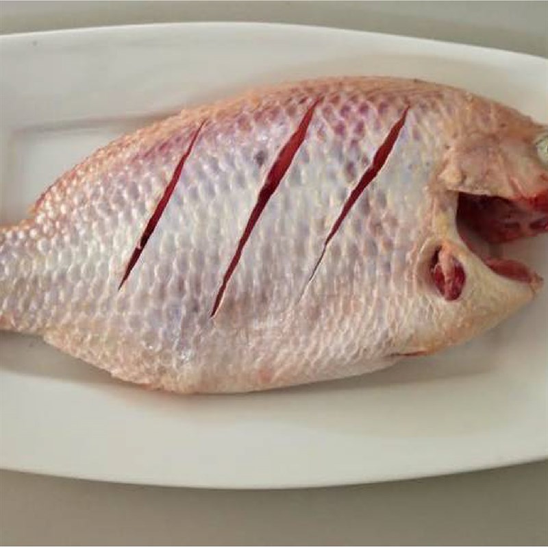 Step 1 Prepare the red tilapia Red tilapia steamed with gourd