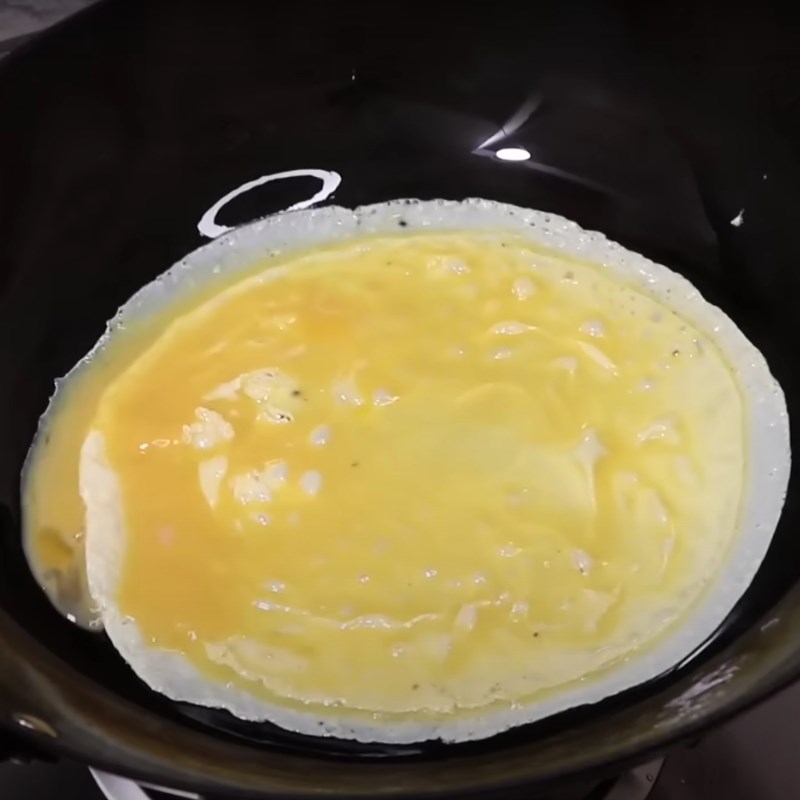 Step 2 Fry the eggs and sausage for Savory Bò Bía