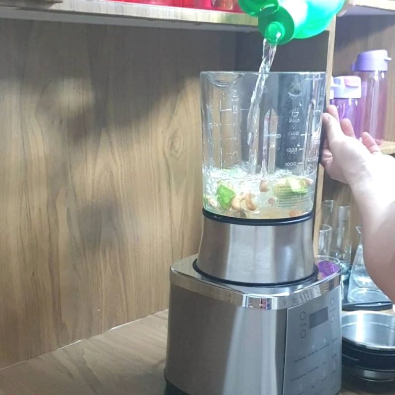 Step 2 Put into the milk maker Cashew Oat Milk with butter and rock sugar