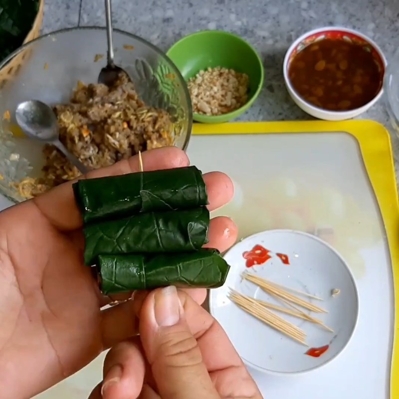 Step 4 Frog rolls with betel leaves Grilled frog rolls with betel leaves