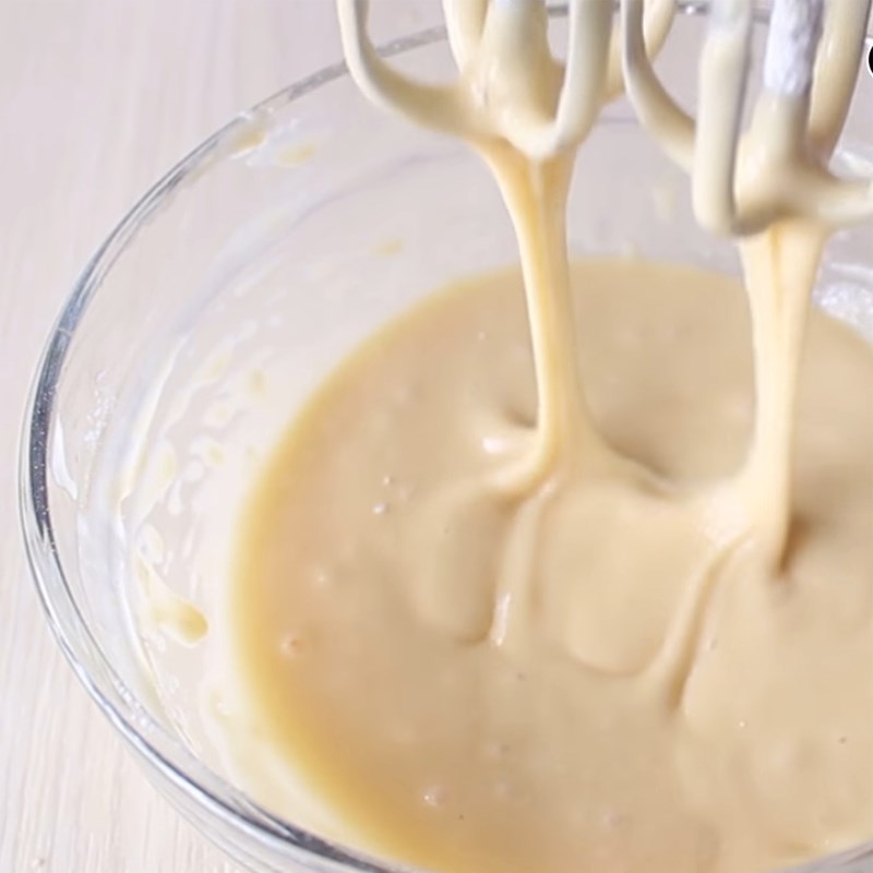 Step 2 Beat eggs and sift flour Malaysia cake - Malaysian cake