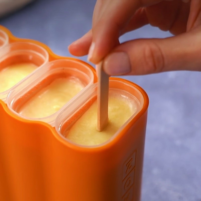 Step 4 Pour into Molds and Freeze Pineapple Ice Cream Stick