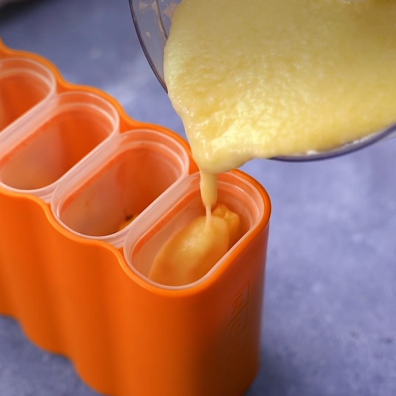 Step 4 Pour into Molds and Freeze Pineapple Ice Cream Stick