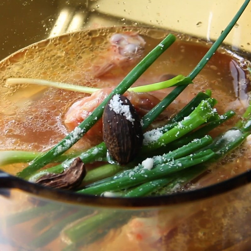 Step 4 Simmer the broth and cook the tomato hotpot Tomato hotpot