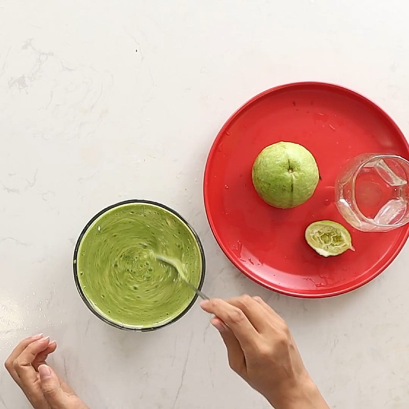 Step 2 Pressing water from pennywort, guava, and orange Pennywort guava orange juice