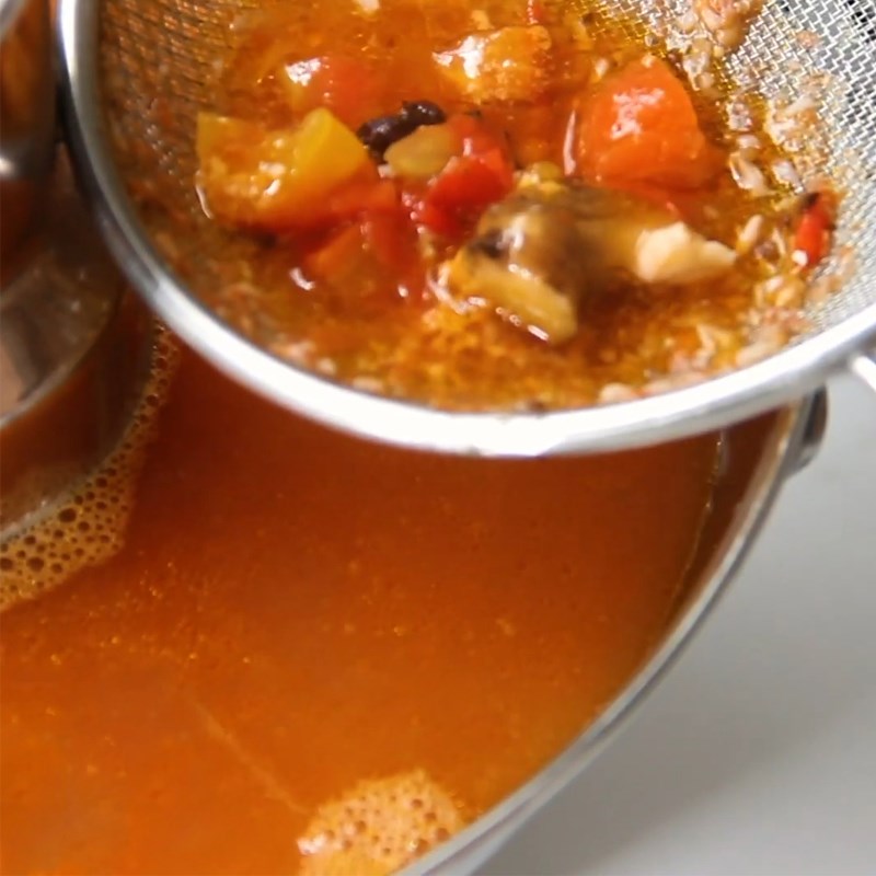 Step 5 Prepare the mushroom sauce and finish Tomato Hot Pot