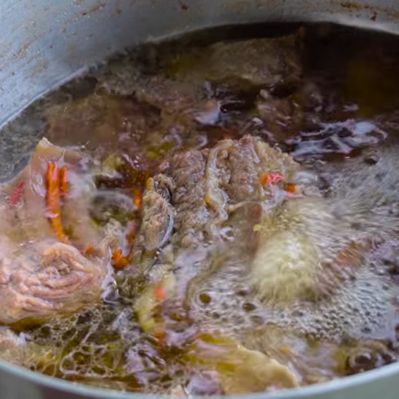 Step 4 Braising meat Buffalo meat braised in clay pot