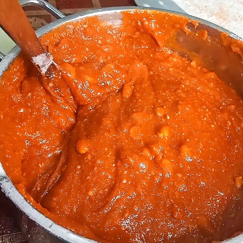Step 3 Stir the flour into the gac mixture Gac lam cake